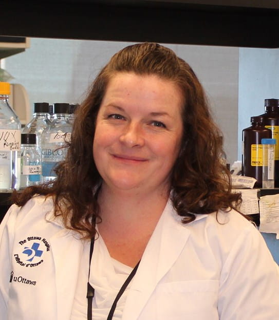 Dr Christina Addison in a laboratory